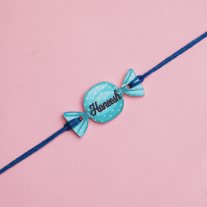 Personalized Handmade Candy Acrylic Kids Rakhi With Roli Chawal - Close-up of personalized bracelet