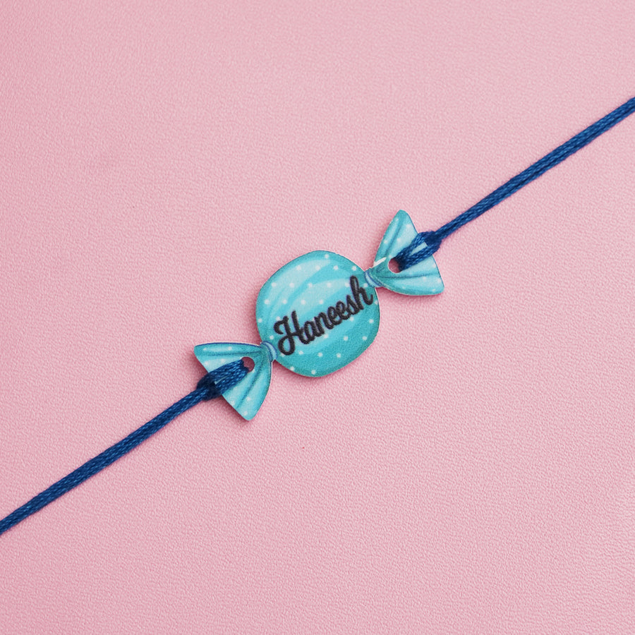 Personalized Handmade Candy Acrylic Kids Rakhi With Roli Chawal - Close-up of personalized bracelet