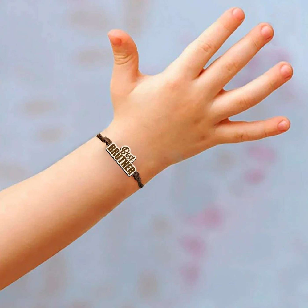 Handmade Best Brother Wooden Rakhi With Roli Chawal - Child wearing bracelet on wrist