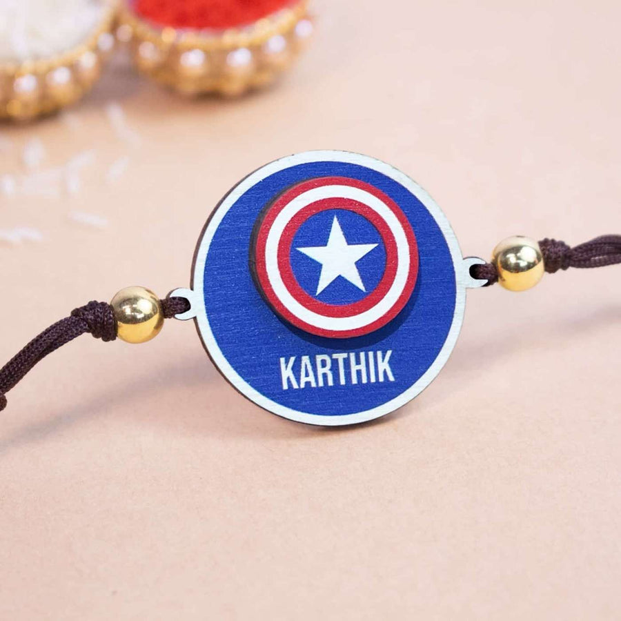 Personalized Handmade Captian America Wooden Kids Rakhi With Roli Chawal - Close-up of Personalized Rakhi