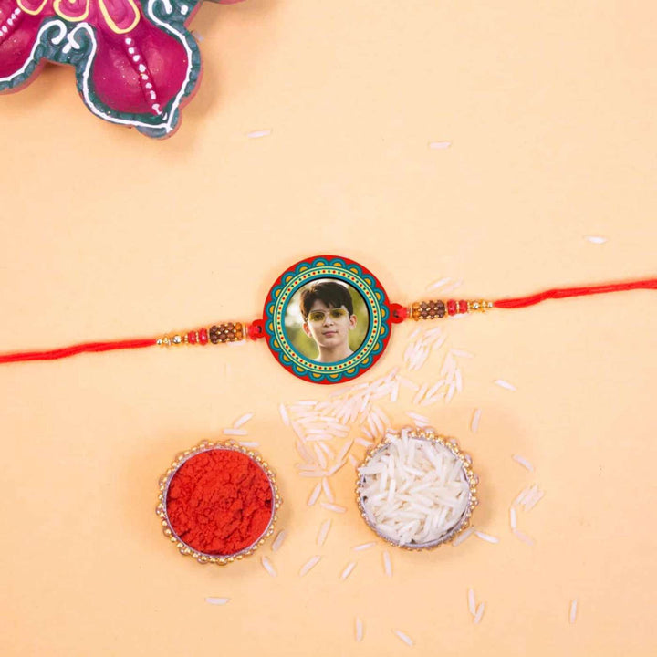 Photo Personalized Handmade Elegant Wooden Rakhi With Roli Chawal - Top View with Decorative Items