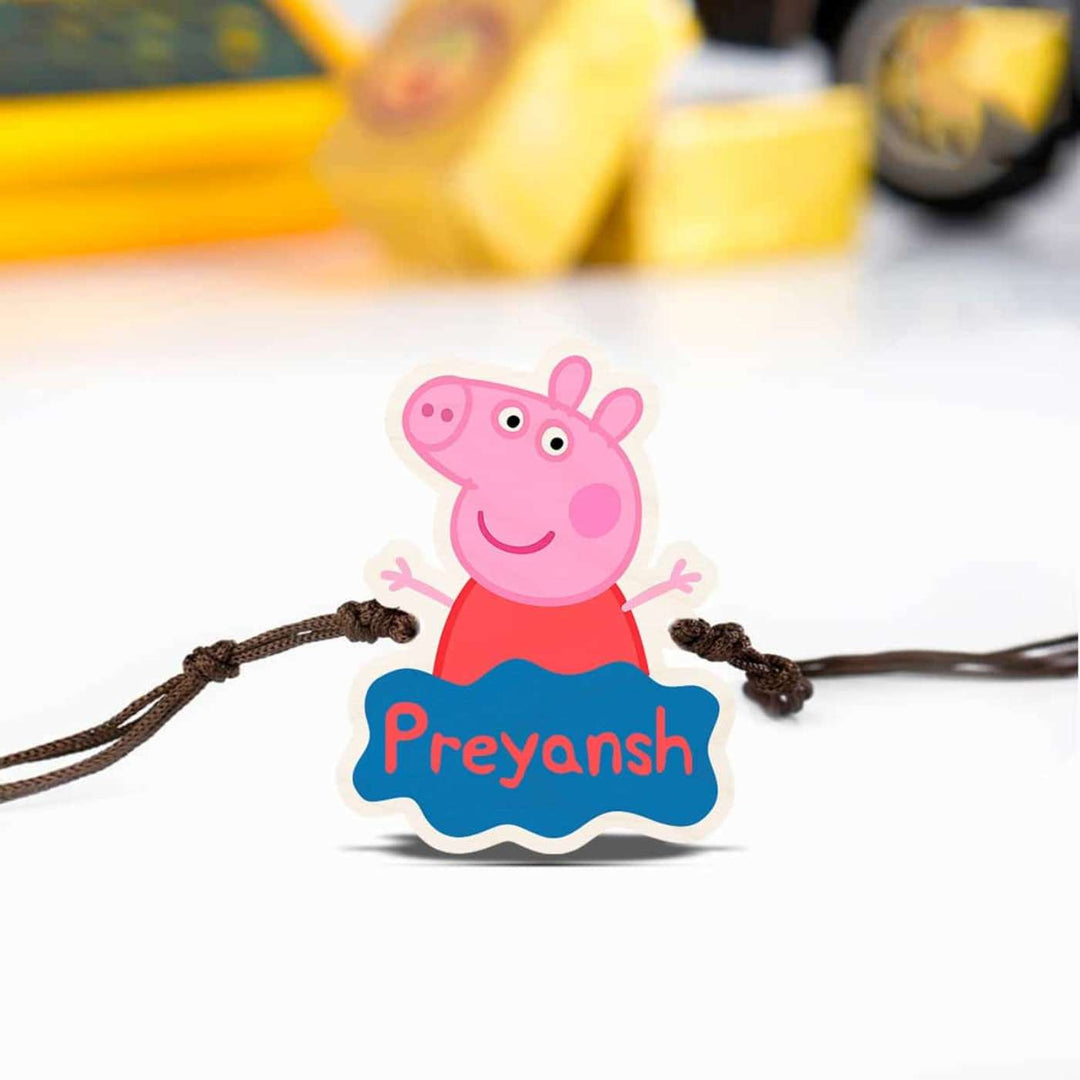 Personalized Handmade Peppa Pig Wooden Kids Rakhi With Roli Chawal - Flat Lay with Tied Strings