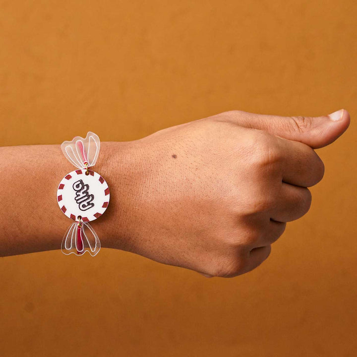 Personalized Handmade Chocolate Acrylic Kids Rakhi With Roli Chawal - Worn on wrist with hand gesture