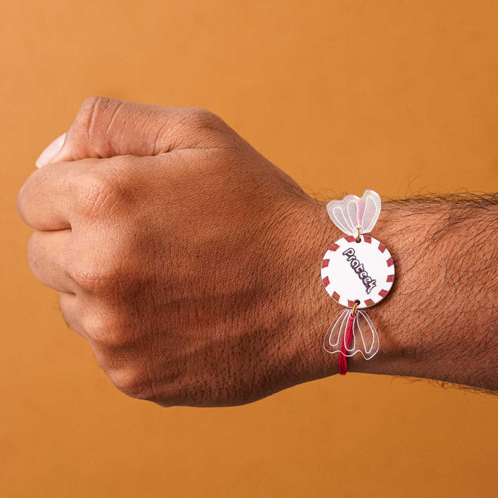 Personalized Handmade Chocolate Acrylic Kids Rakhi With Roli Chawal - Worn on wrist with clenched fist
