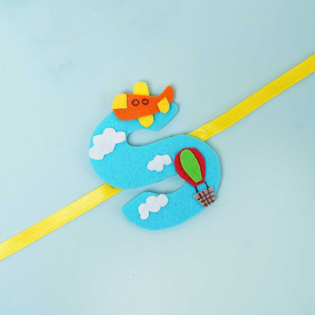 Personalised Handmade Hot Air Ballon Felt Rakhi With Chocolates Roli Chawal - Front View of Letter Ribbon (4)