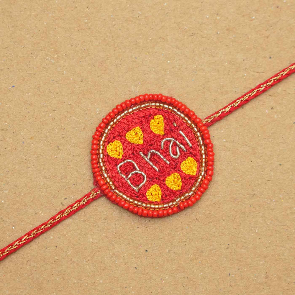 Handmade Beaded Bhai Rakhi With Roli Chawal 1 - Close-up of Rakhi centerpiece