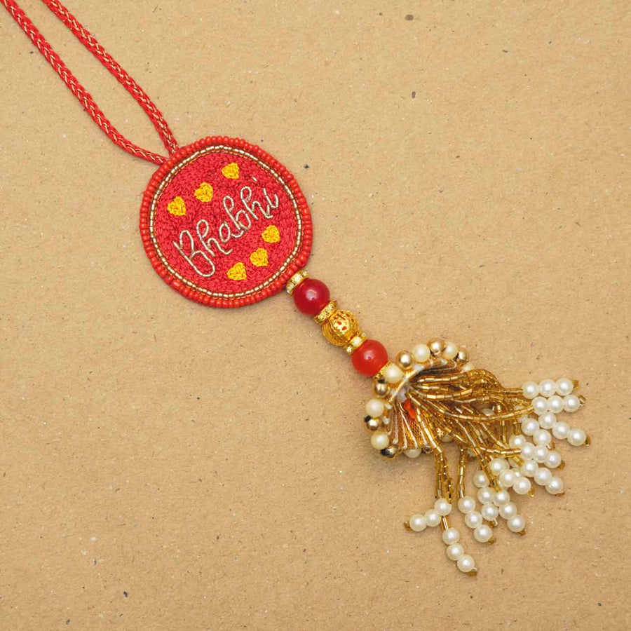 Handmade Beaded Bhabhi Lumba Rakhi With Roli Chawal - Close-up of single Rakhi