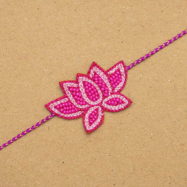 Handmade Beaded Lotus Rakhi With Roli Chawal - Close-up Front View
