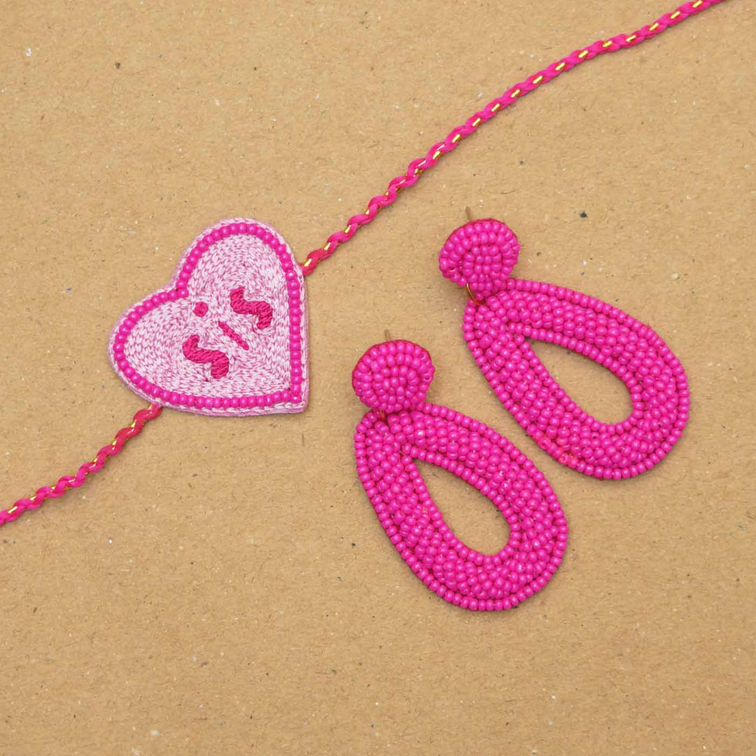 Handmade Beaded Chupa Chups Rakhi Hamper For Sisters Set Of 3 - Close-up of Rakhi and Earrings