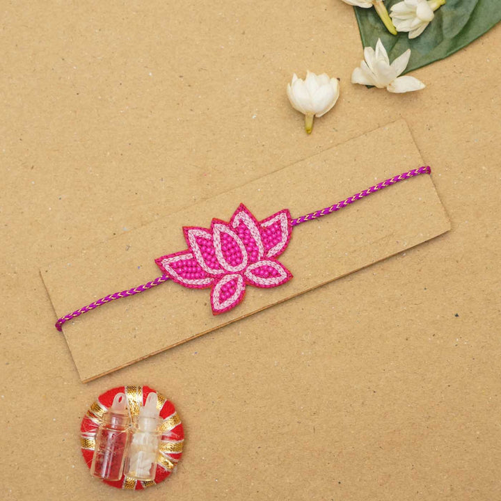 Handmade Beaded Lotus Rakhi With Roli Chawal - Flat Lay Front View