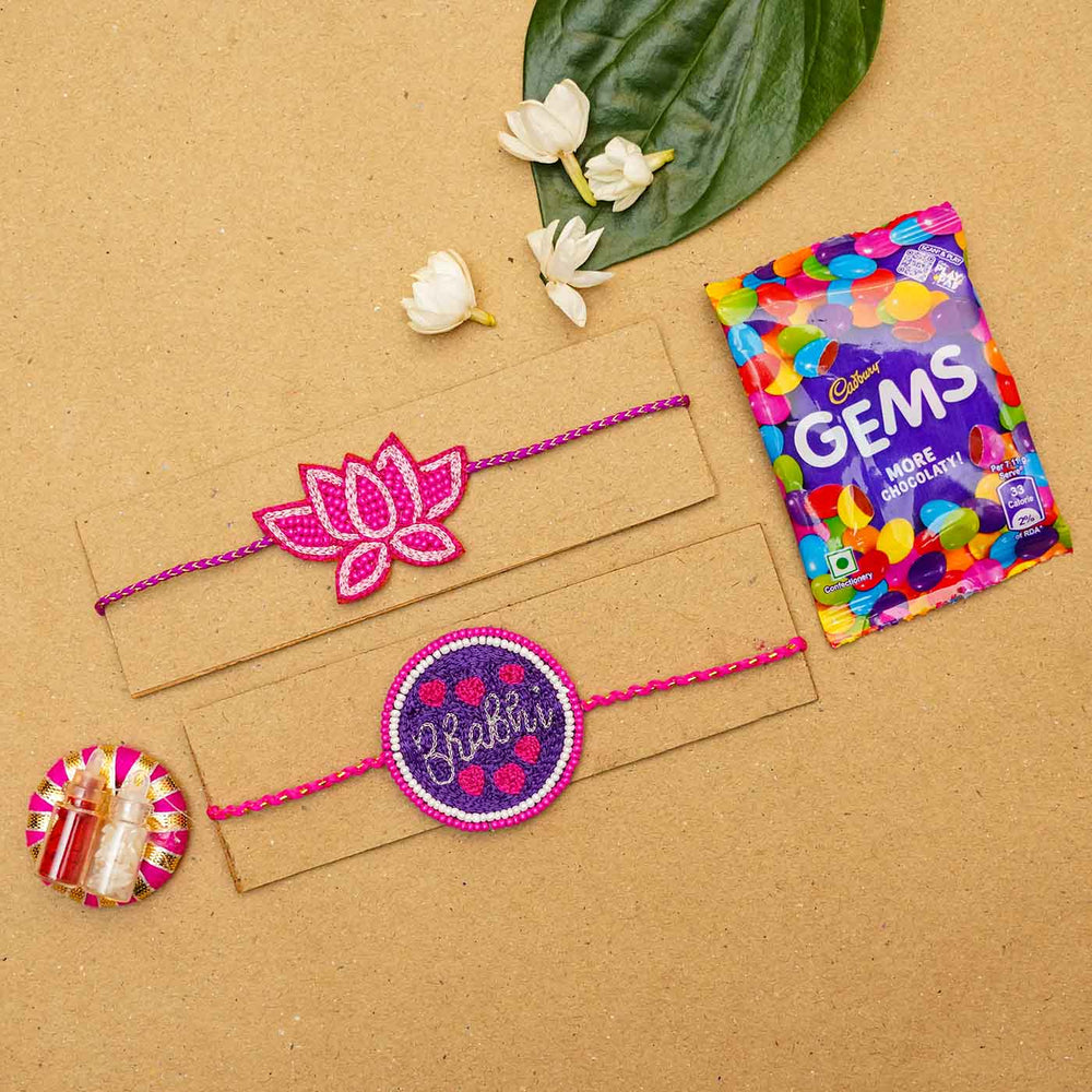 Handmade Beaded Rakhi Hamper For Bhaiya And Bhabhi Set Of 3 - Flat Lay with Accessories