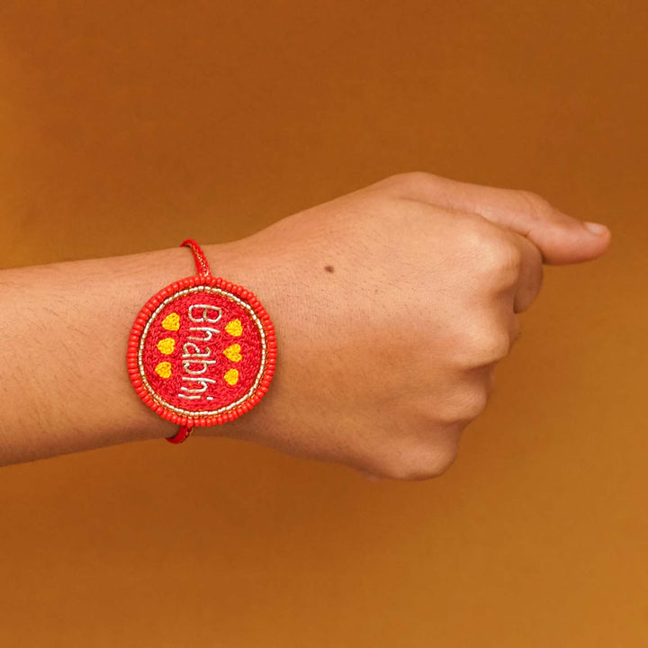 Handmade Beaded Bhabhi Rakhi With Roli Chawal - Wrist Wearing View