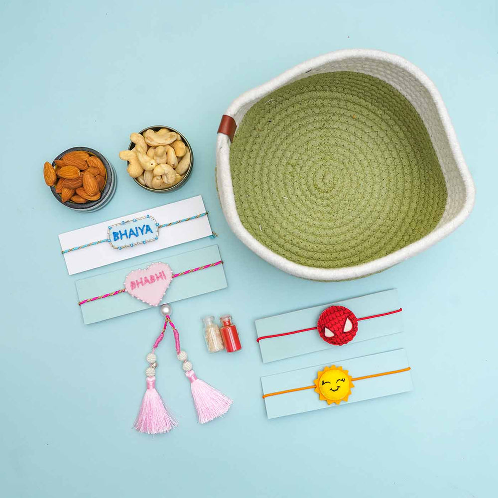 Handmade Felt Rakhi Box Hamper With Dry Fruits For Bhaiya Bhabhi And Kids Set Of 6 - Flat Lay with Product and Basket