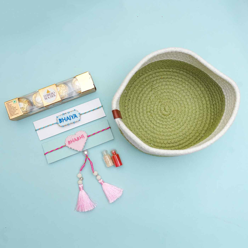 Handmade Felt Rakhi Basket Hamper With Dry Fruits And Roli Chawal For Bhaiya And Bhabhi Set Of 2 - Flat Lay with Basket and Gift Box