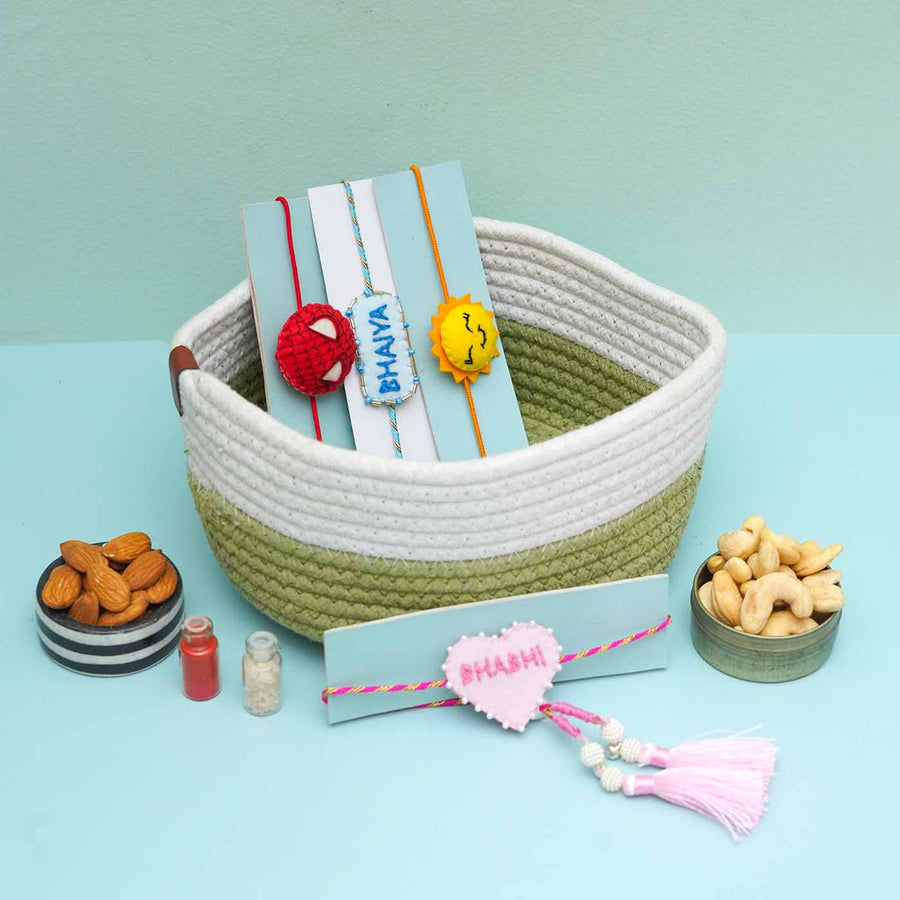 Handmade Felt Rakhi Box Hamper With Dry Fruits For Bhaiya Bhabhi And Kids Set Of 6 - Product Arrangement in Basket