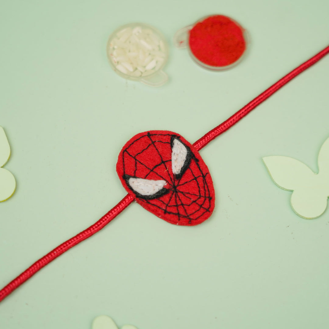 Handmade Spiderman Theme Felt Kids Rakhi For Brother - Top View with Decorative Items