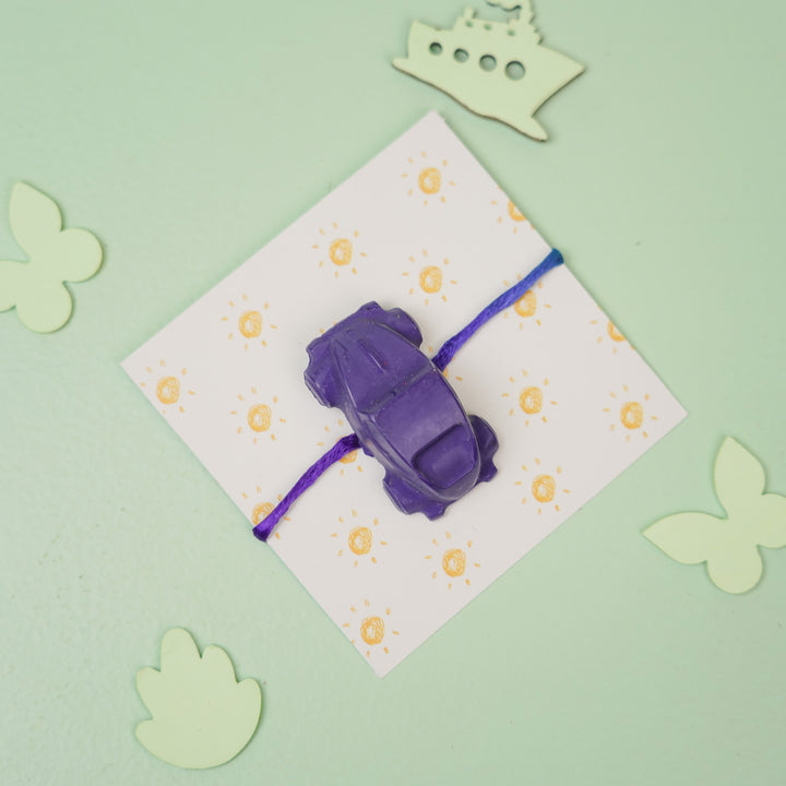 Customized Handmade Vehicles Theme Wax Rakhi For Kids - Styled Flat Lay with Car (5)