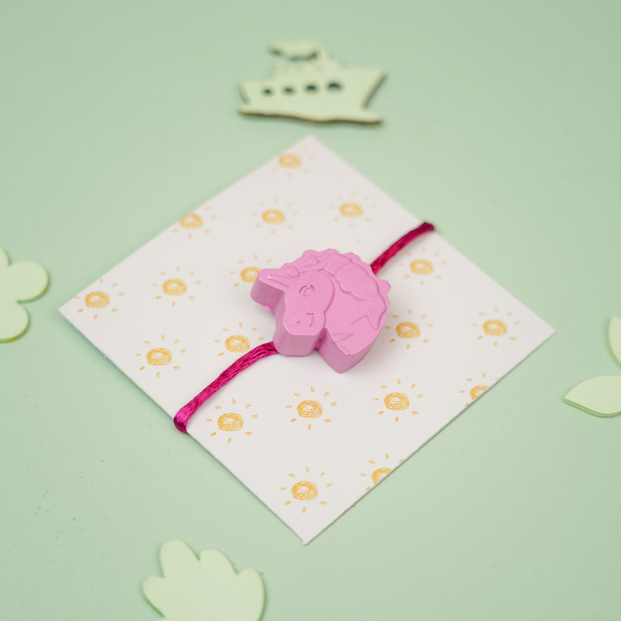 Customized Handmade Unicorn Theme Wax Rakhi For Kids - Front View on Packaging