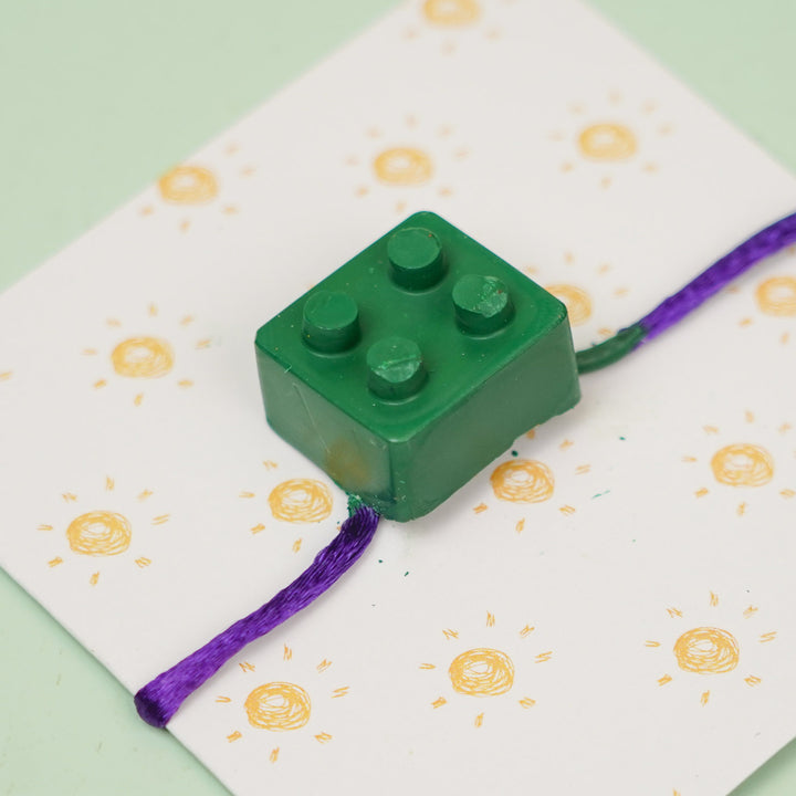 Customized Handmade Lego Block Theme Wax Rakhi For Kids - Close-up of Cube Detail
