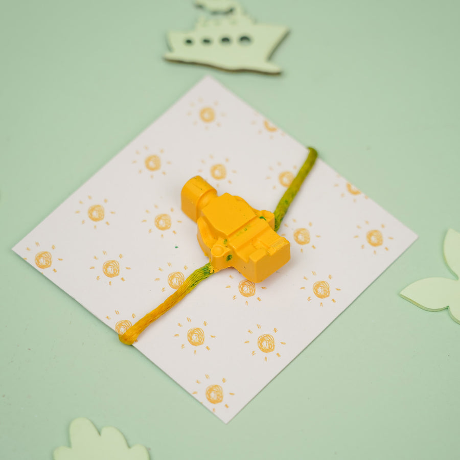 Customized Handmade Lego Man Theme Wax Rakhi For Kids - Front View of Toy Bracelet