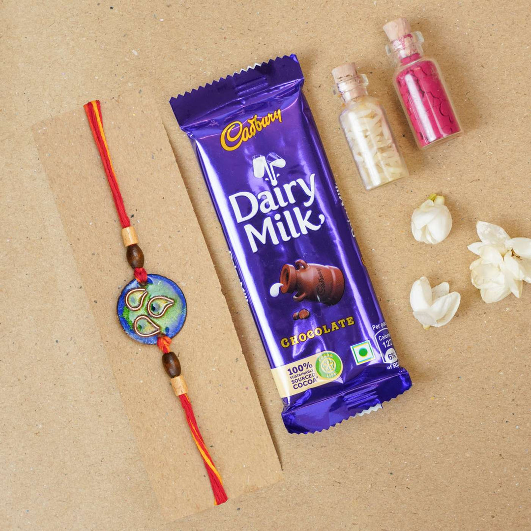 Handmade Morpankh Copper Enamel Rakhi With Chocolates And Roli Chawal - Blue bracelet with chocolate gift set