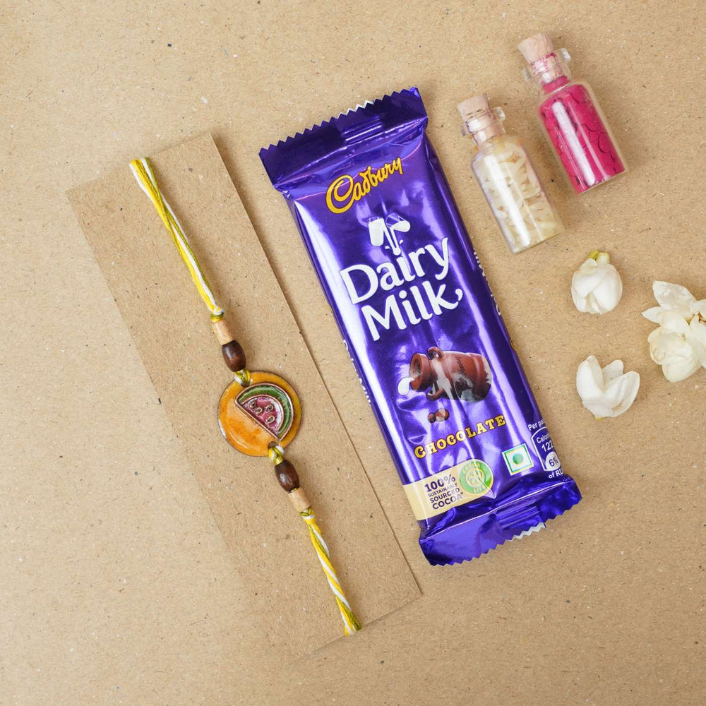 Handmade Tarbooz Red Copper Enamel Rakhi With Chocolates And Roli Chawal - Rakhi with chocolate gift set