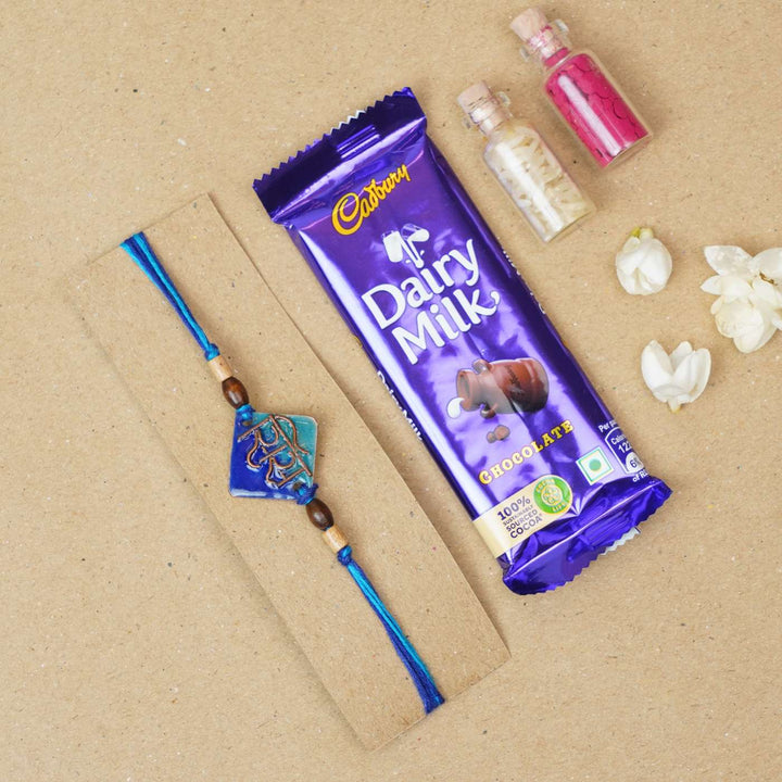Handmade Sis Blue Copper Enamel Rakhi With Chocolates And Roli Chawal - Rakhi with chocolate gift set