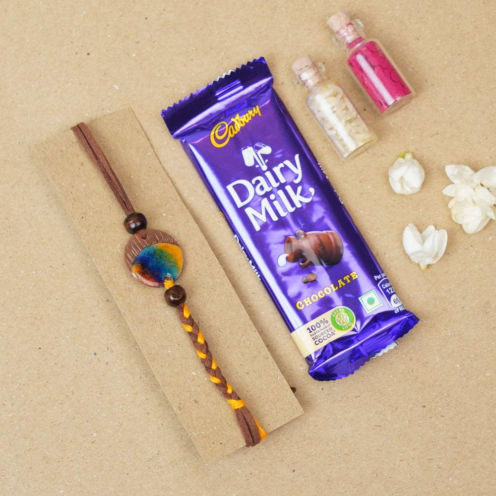 Handmade Indraa Textured Multicolour Copper Enamel Rakhi With Chocolates And Roli Chawal - Rakhi with chocolate gift set