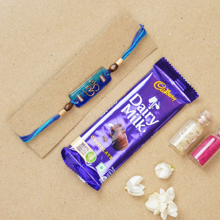 Handmade Rectangle Om Copper Enamel Rakhi With Chocolates And Roli Chawal - Packaging and Gift Combo (7)