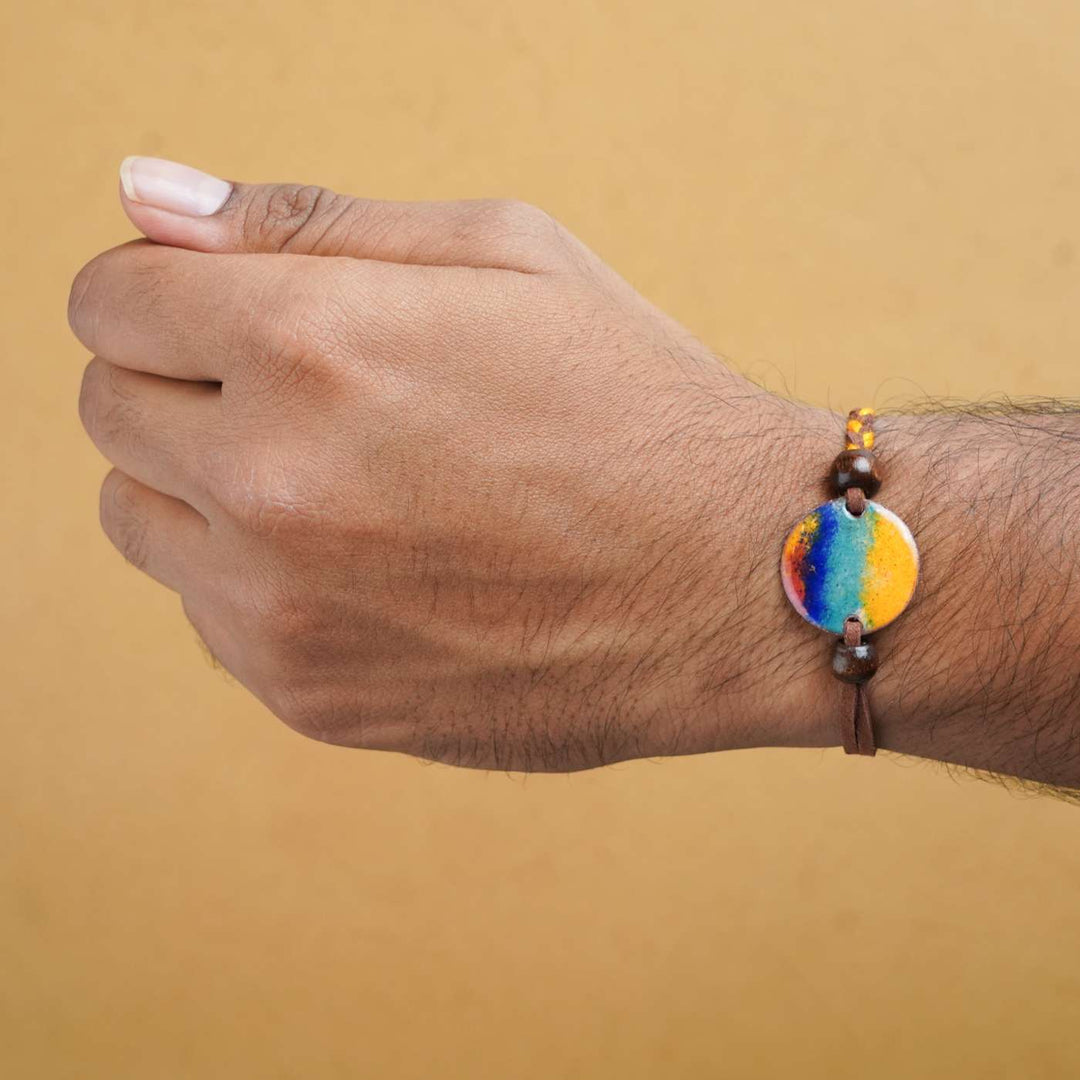 Handmade Indraa Multicolour Copper Enamel Rakhi With Chocolates And Roli Chawal - Bracelet Worn on Wrist