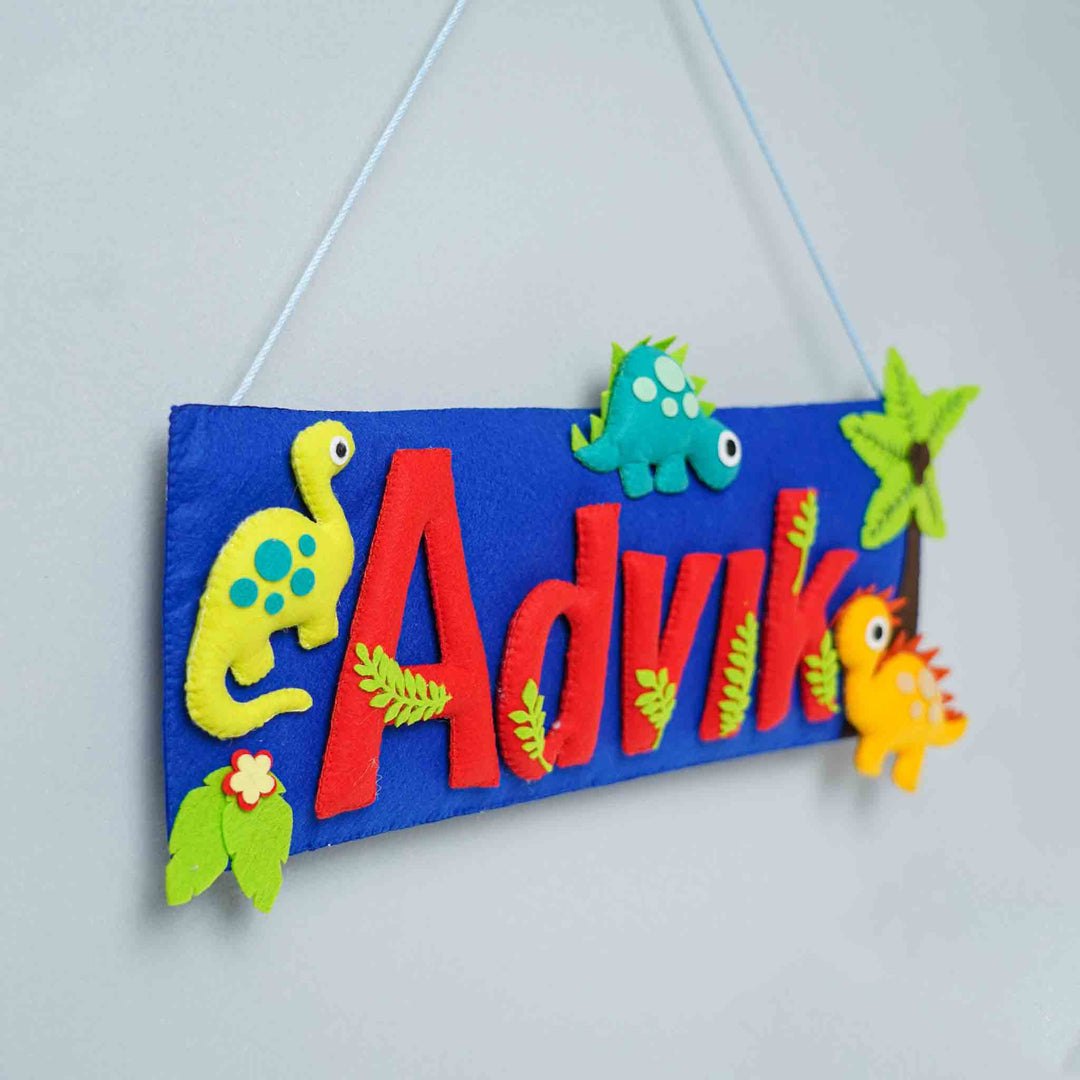 Handcrafted Dinosaur Themed Rectangle Felt Name Plate For Kids - Angled Hanging View