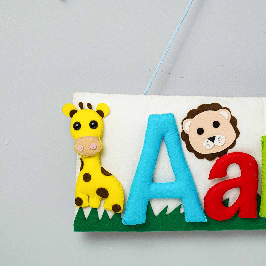 Handcrafted Animal Safari Themed Rectangle Felt Name Plate For Kids - Hanging Close-up with Animal Detail