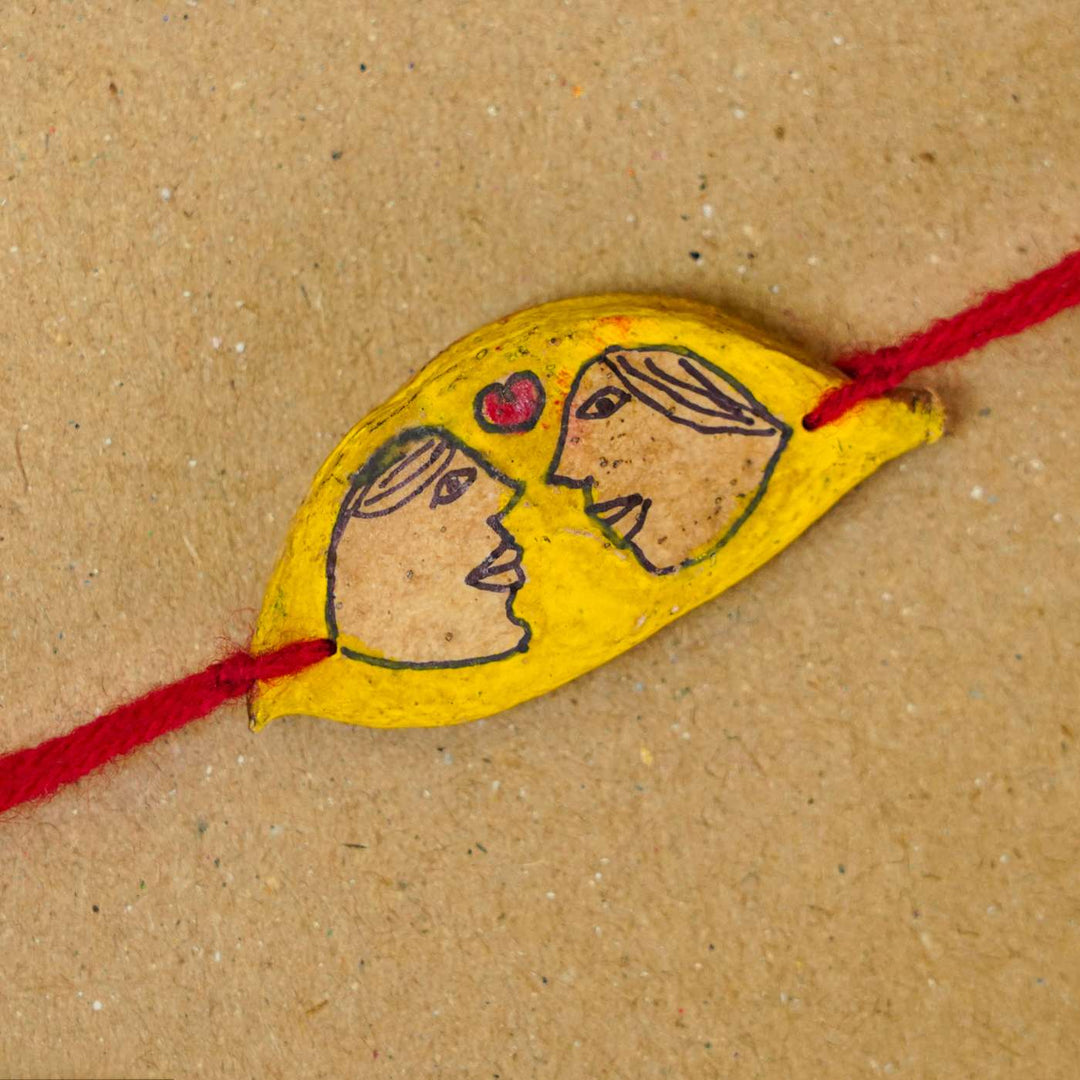 Handmade Plantable Seed Rakhi With Roli Chawal - Close-up of Bracelet Charm
