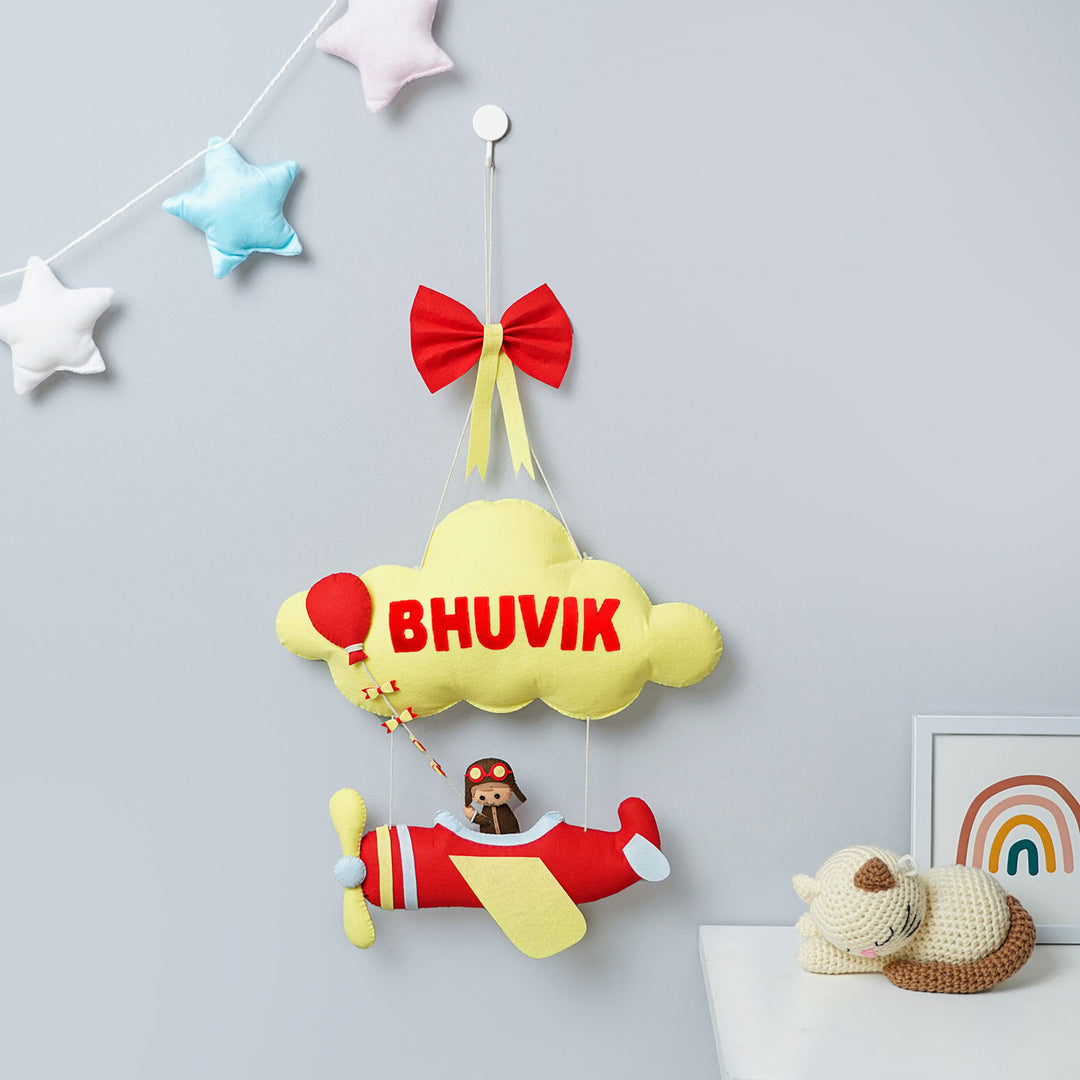 Handmade Personalized Felt Name Hanging Yellow Aviator - Hanging Personalization Example on Wall