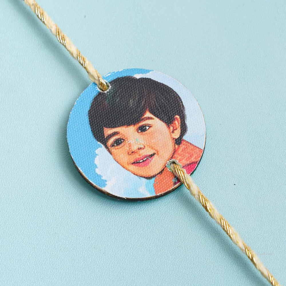 Handpainted Personalized Caricature Rakhi With Roli Chawal 3 - Close-up of circular photo charm