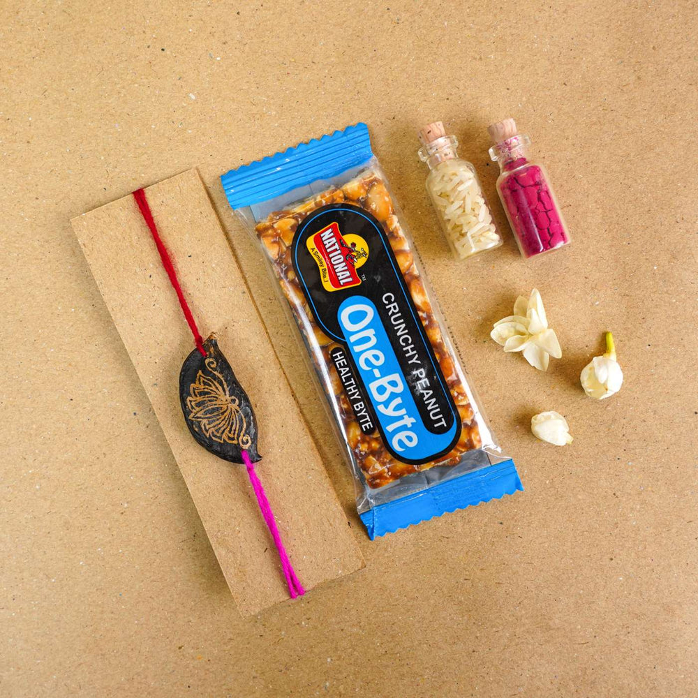 Handmade Plantable Painted Lotus Seed Rakhi With Roli Chawal - Gift set with Rakhi and sweets