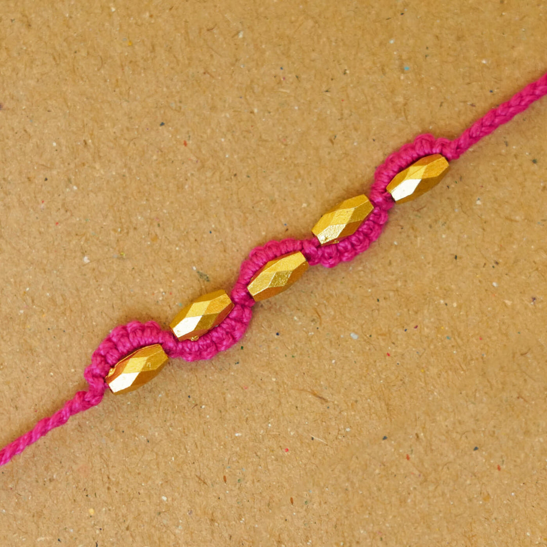 Handmade Macrame Five Gold Beaded Rakhi With Roli Chawal - Close-up Beaded Bracelet Detail (14)