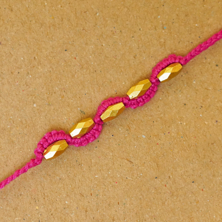 Handmade Macrame Five Gold Beaded Rakhi With Roli Chawal - Close-up Beaded Bracelet Detail (14)