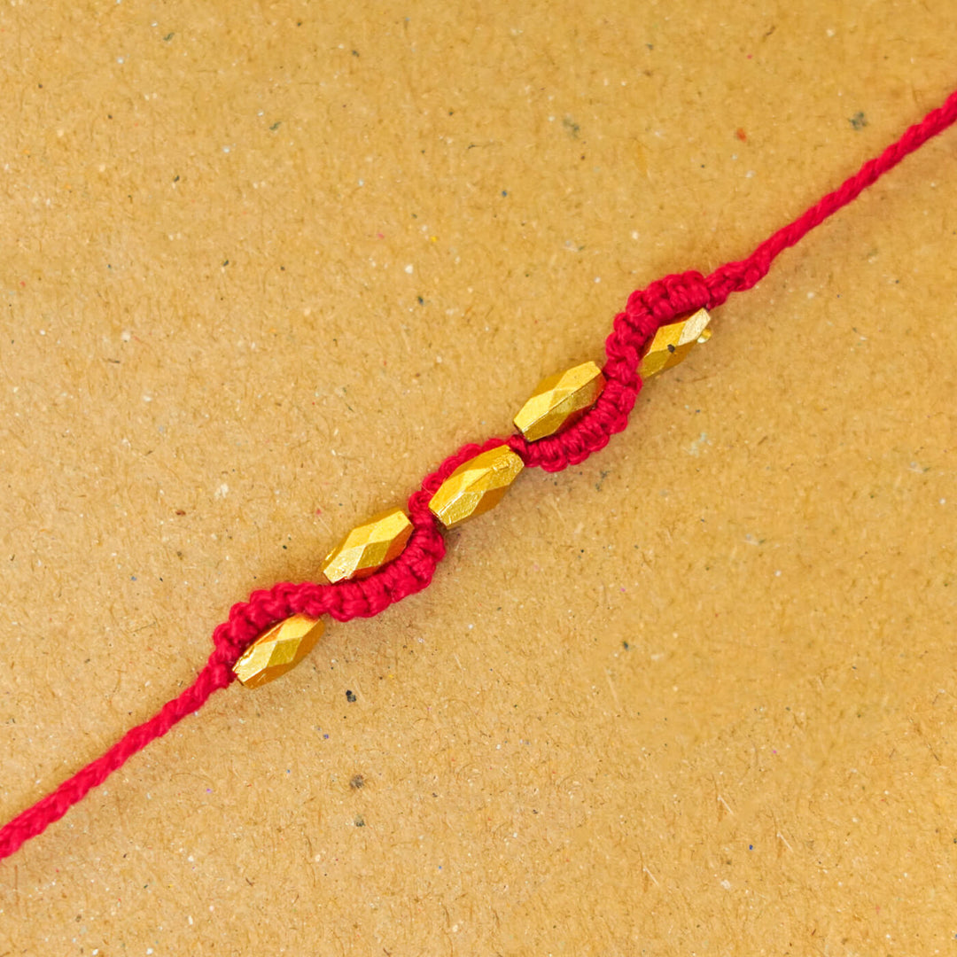 Handmade Macrame Five Gold Beaded Rakhi With Roli Chawal - Close-up Beaded Bracelet Detail