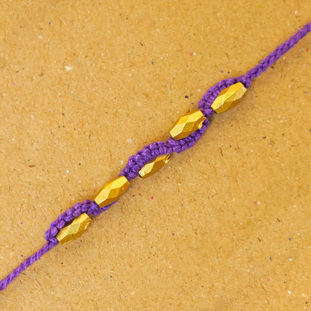 Handmade Macrame Five Gold Beaded Rakhi With Roli Chawal - Close-up Beaded Bracelet Detail (18)