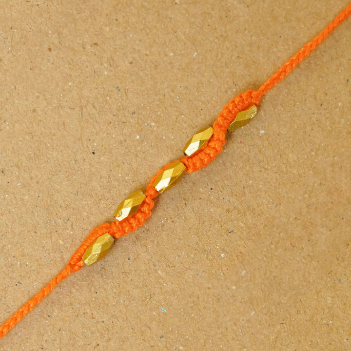 Handmade Macrame Five Gold Beaded Rakhi With Roli Chawal - Close-up Beaded Bracelet Detail (10)