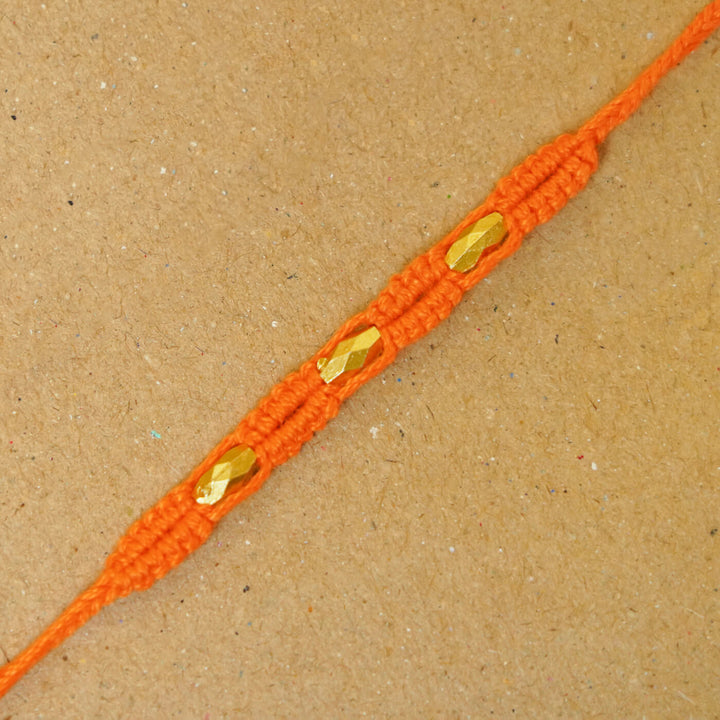 Handmade Macrame Three Gold Beaded Rakhi With Roli Chawal - Close-up Detail (10)