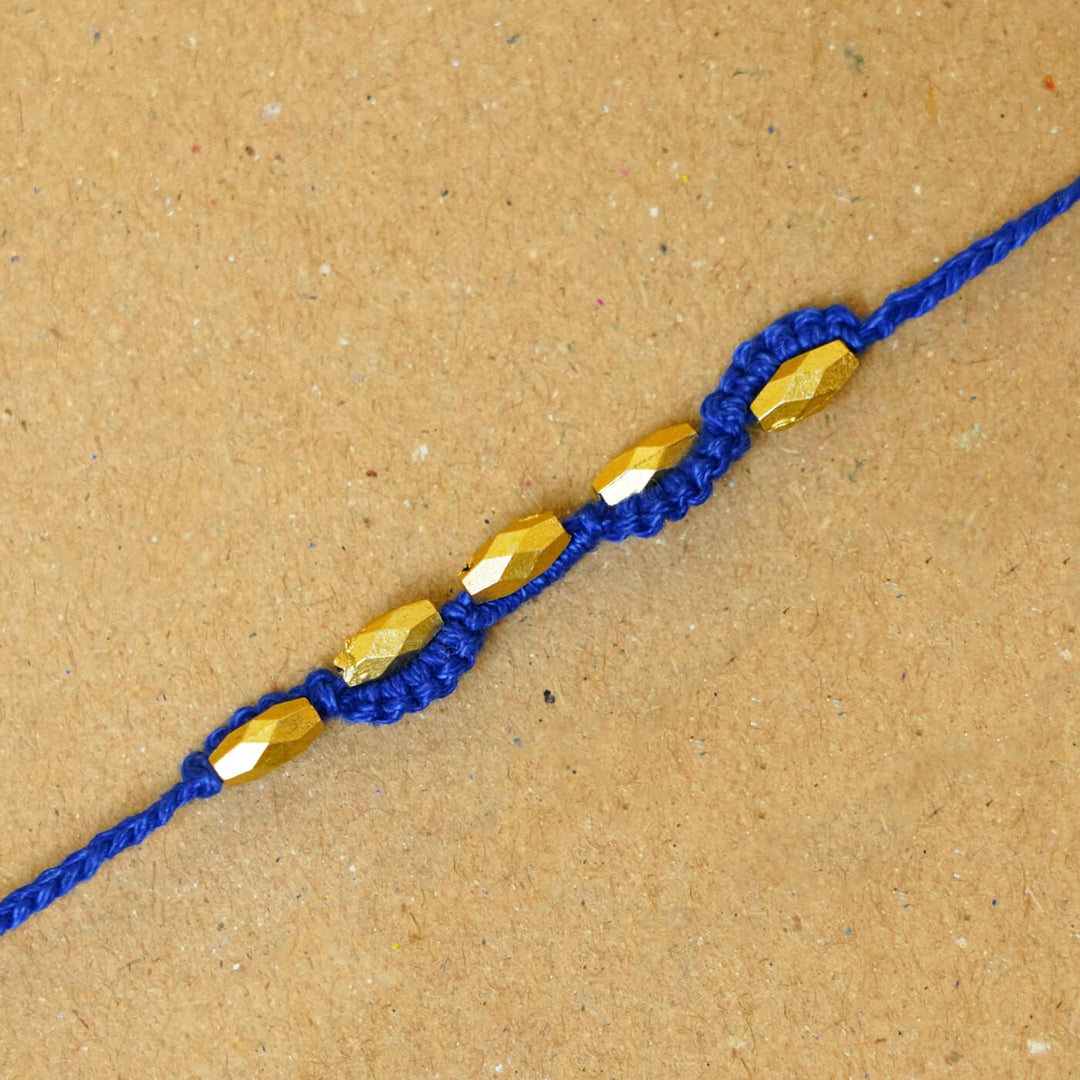 Handmade Macrame Five Gold Beaded Rakhi With Roli Chawal - Close-up Beaded Bracelet Detail (2)