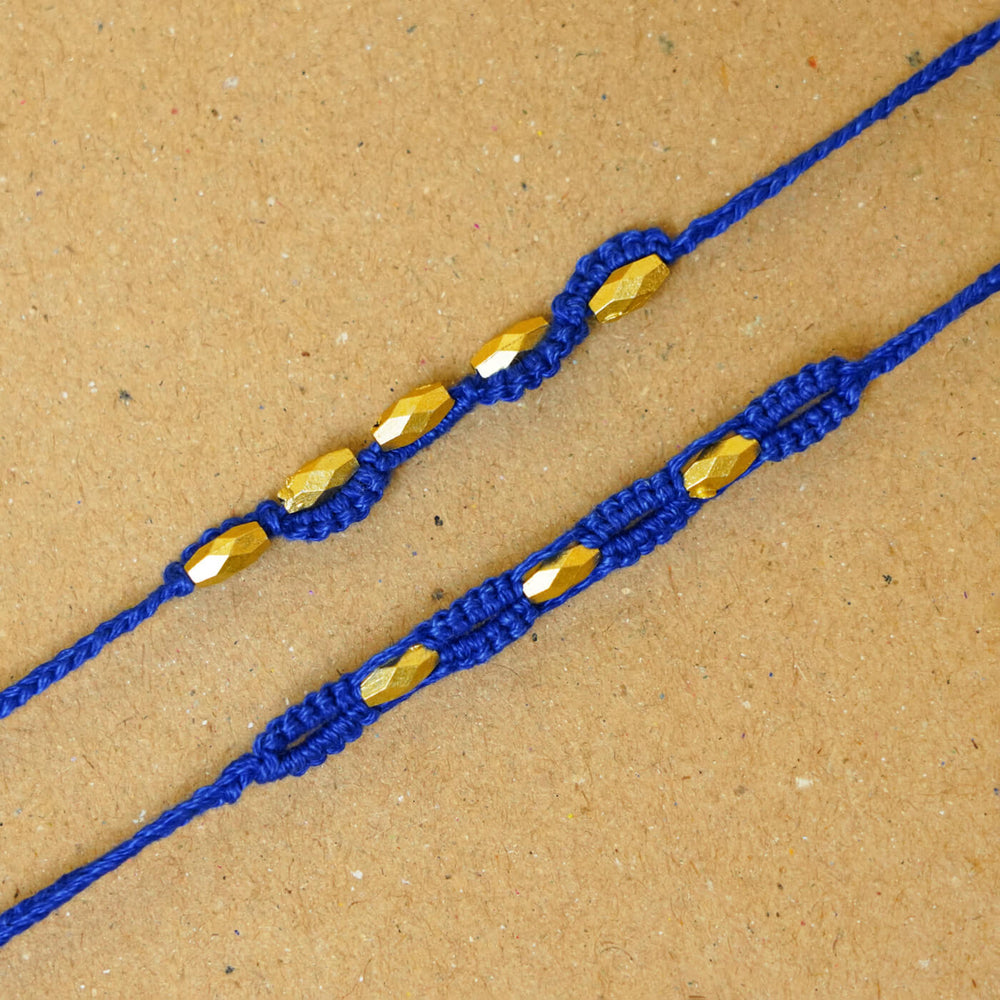 Handmade Macrame Beaded Rakhi With Roli Chawal Set Of 2 - Close-up of blue pair