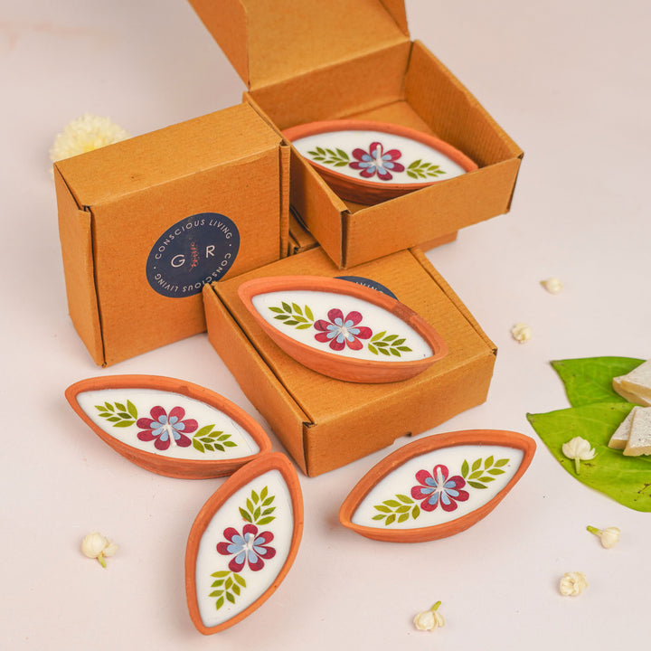 Set of 20 | Soy Wax & Dry Flower Terracotta Festive Diyas | 4 Boat Diyas + 16 Round Diyas