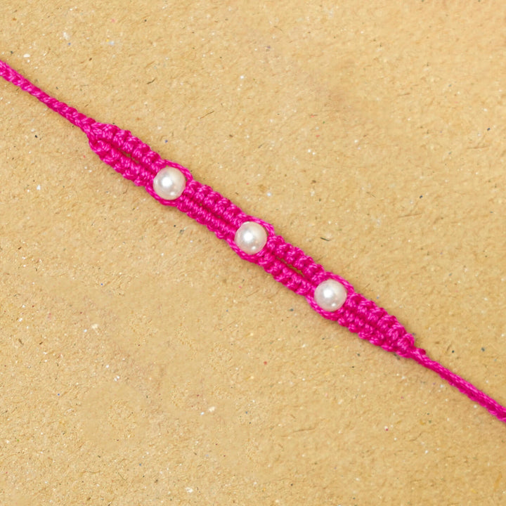 Handmade Macrame Three Pearl Rakhi With Roli Chawal - Close-up Front View (13)