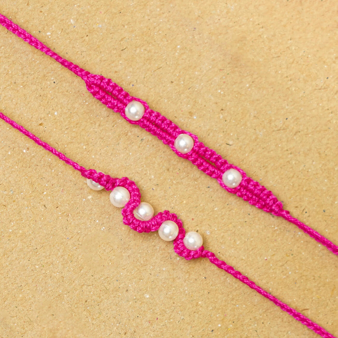 Handmade Macrame Beaded Rakhi With Roli Chawal Set Of 2 1 - Close-up of pink rakhis