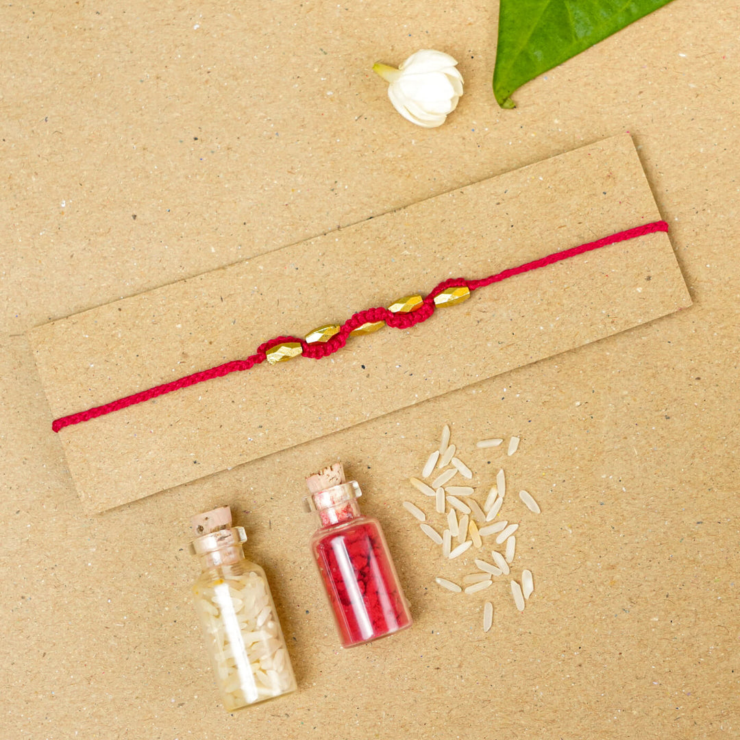 Handmade Macrame Five Gold Beaded Rakhi With Roli Chawal - Close-up Beaded Bracelet Detail (22)