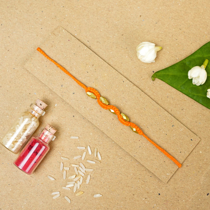 Handmade Macrame Five Gold Beaded Rakhi With Roli Chawal - Beaded Bracelet on Card with Flowers (11)