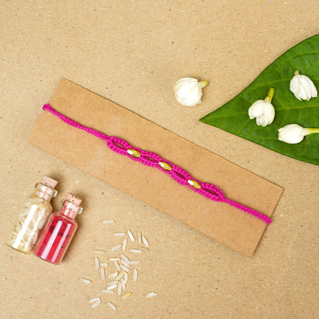 Handmade Macrame Three Gold Beaded Rakhi With Roli Chawal - Displayed on Card with Props (15)